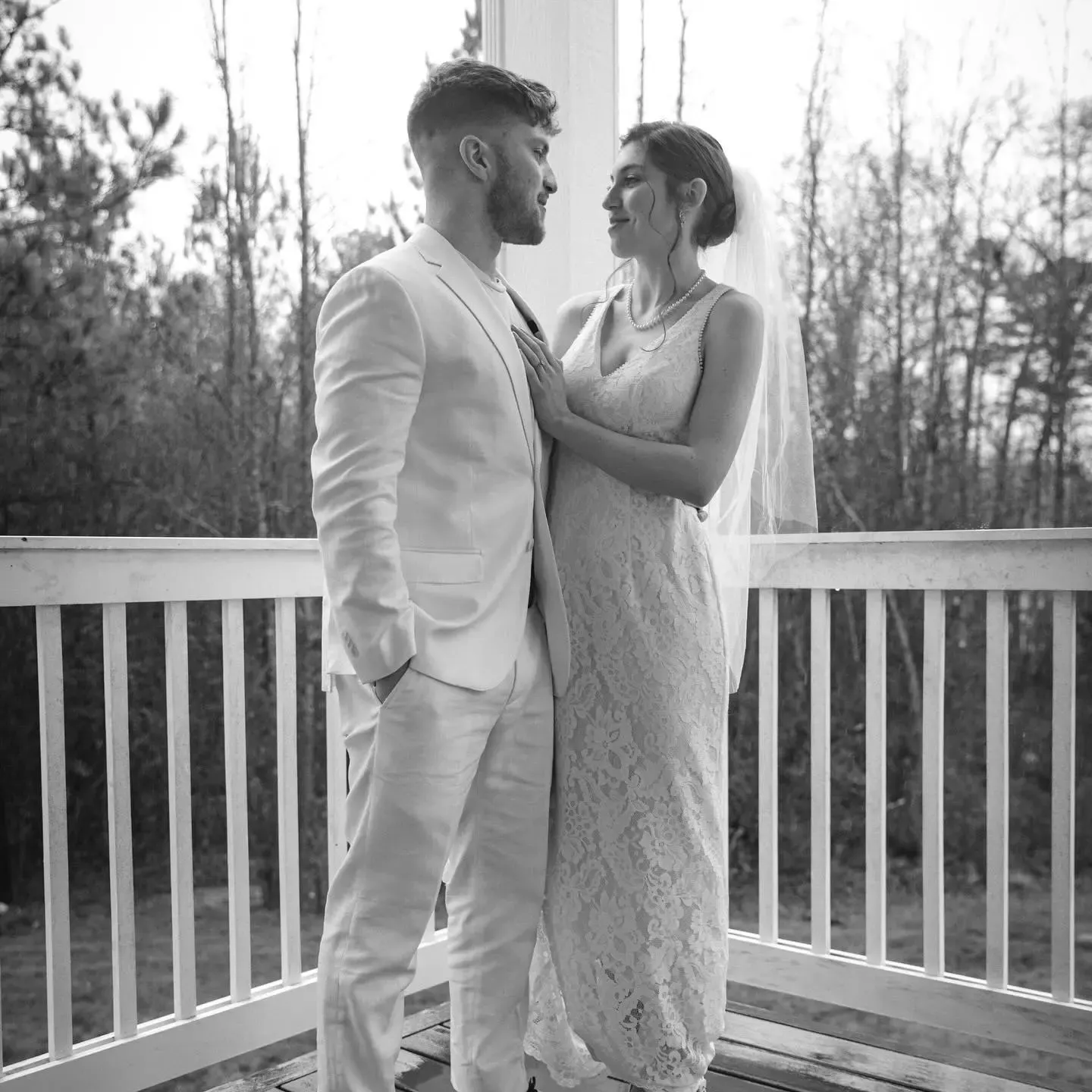 Theron with a couple on their wedding day
